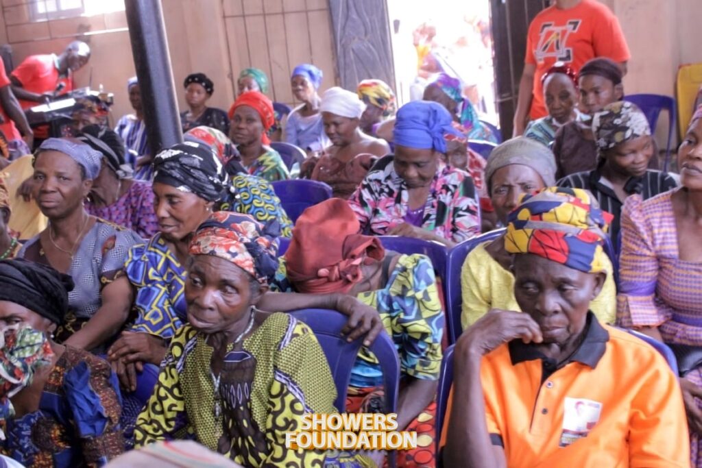 A cross-section of the audience at a Showers foundation Outreach listening to the Health Talk on "What is Tuberculosis and HIV"